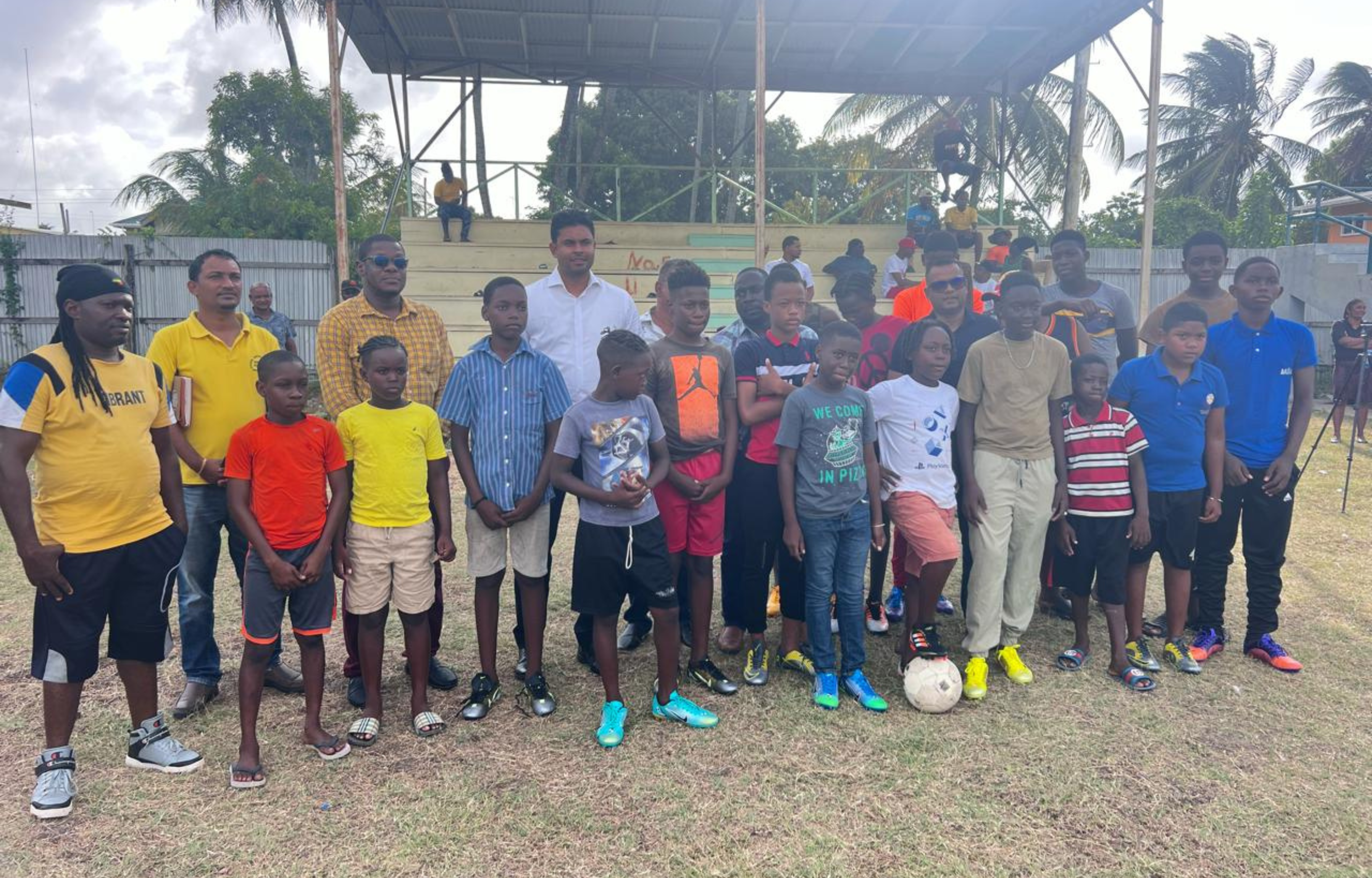 Minister Ramson Delivers Football Gear to Number 5 Village Youth, Engages Region 5 Communities
