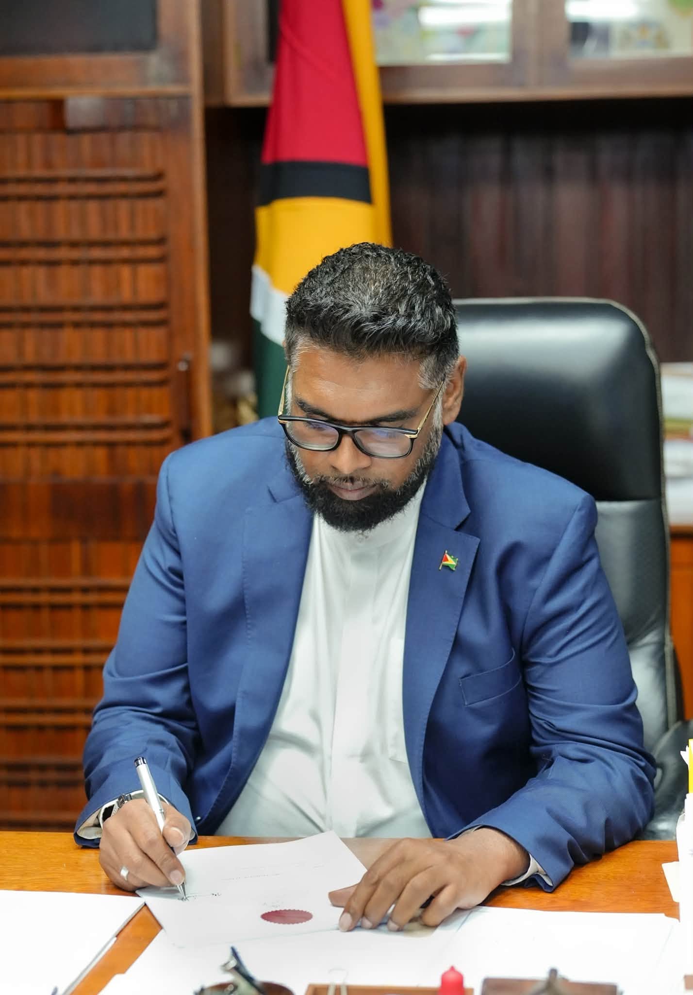 President signs Guyana Development Bank Act into law